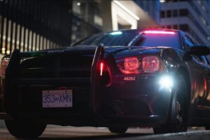 front of police car