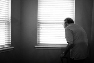 old man by window