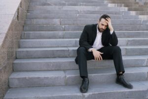 man sitting on steps