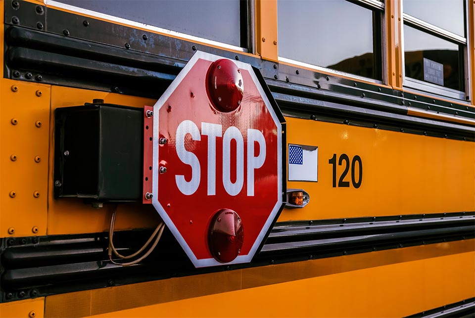 School bus on a Georgia roadway representing school bus and school-zone traffic laws